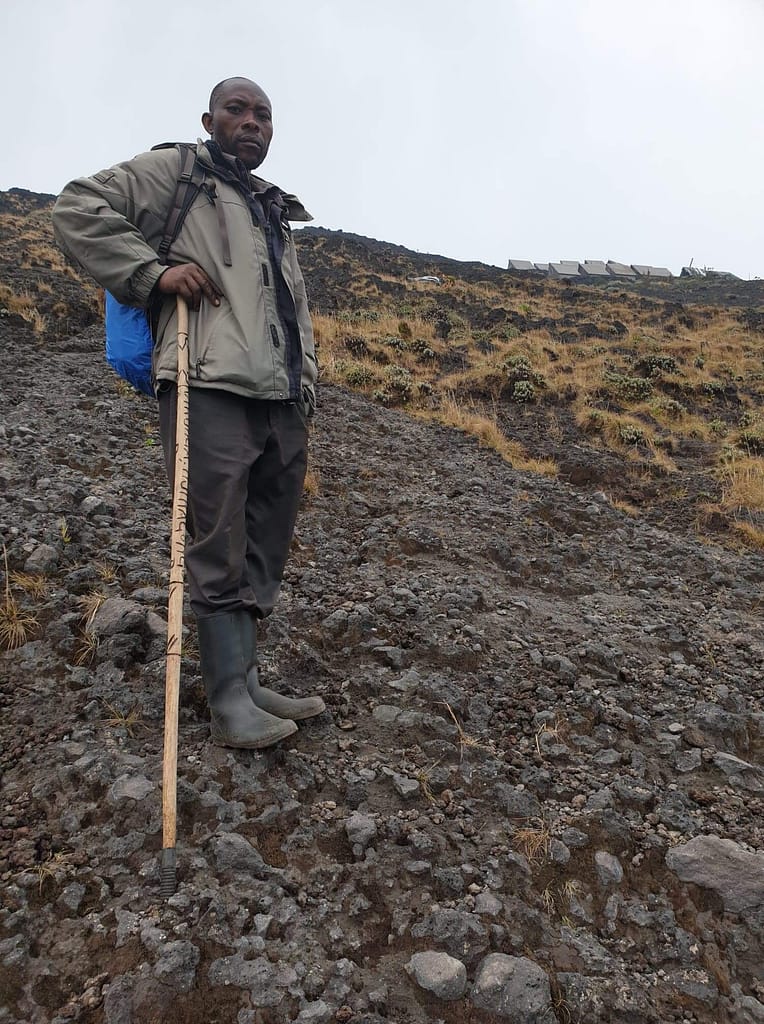 Nyiragongo Volcano Trek Virunga DRC steep hill porter